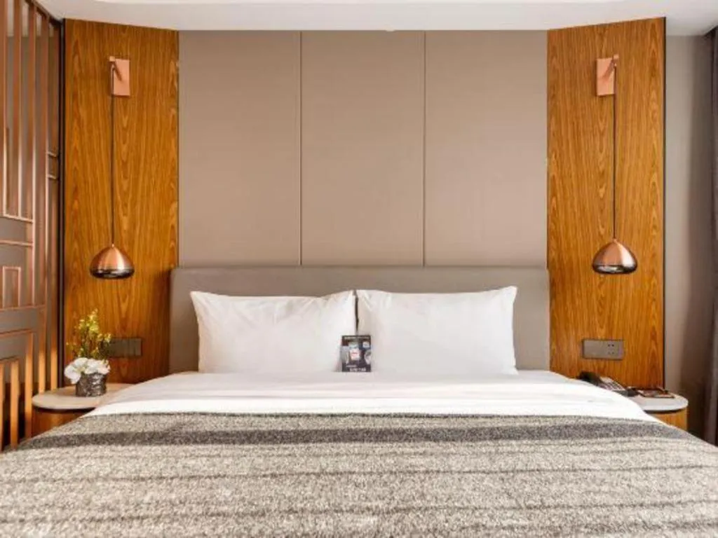 Bed in Yitel Collection Shenyang Hunnan Olympic Sports Center Caixia Street Metro Station