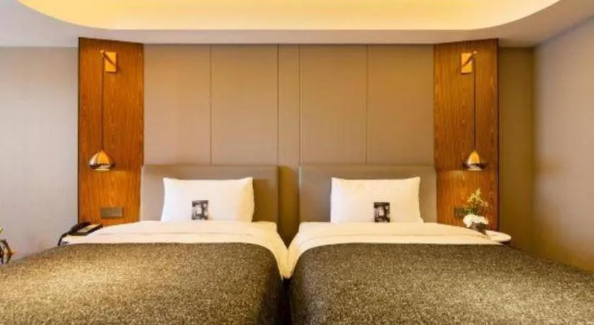 Bed in Yitel Collection Shenyang Hunnan Olympic Sports Center Caixia Street Metro Station