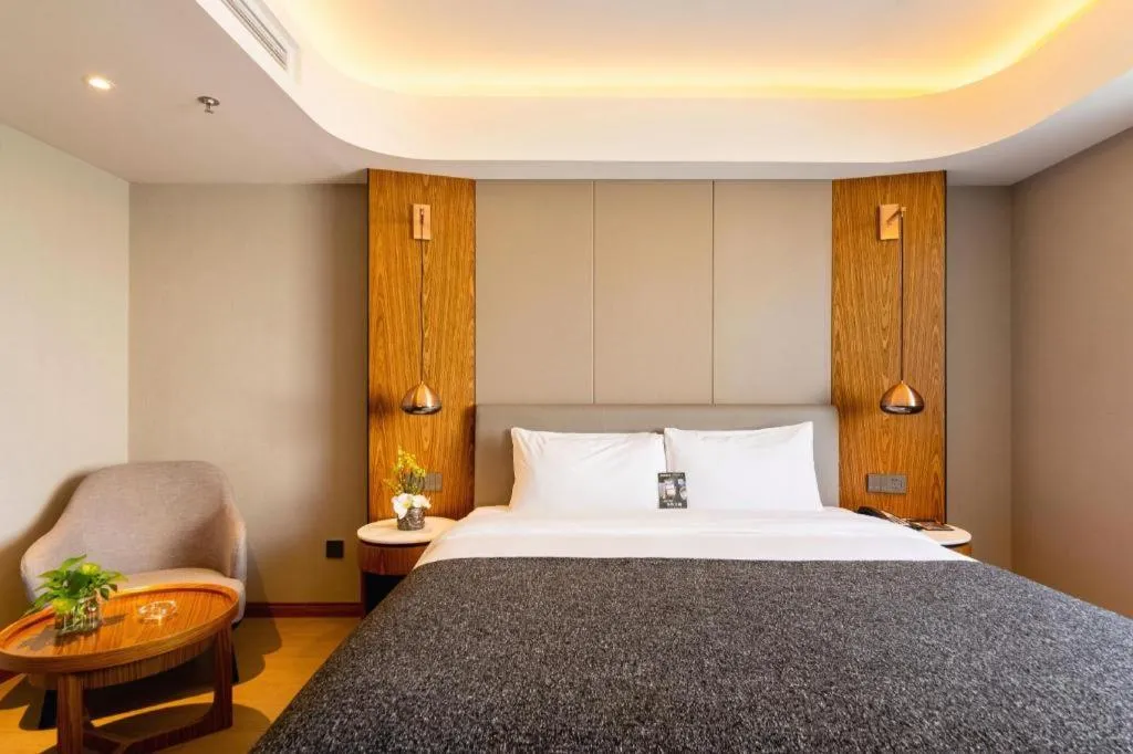 Bed in Yitel Collection Shenyang Hunnan Olympic Sports Center Caixia Street Metro Station