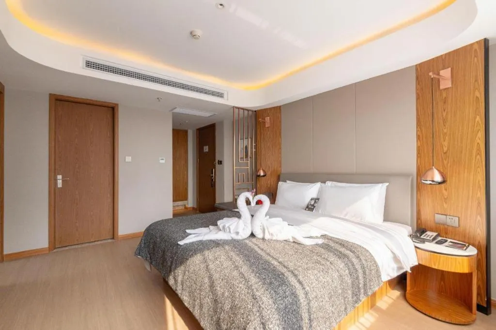 Bed in Yitel Collection Shenyang Hunnan Olympic Sports Center Caixia Street Metro Station