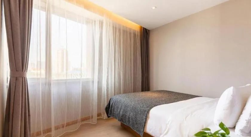 Bed in Yitel Collection Shenyang Hunnan Olympic Sports Center Caixia Street Metro Station