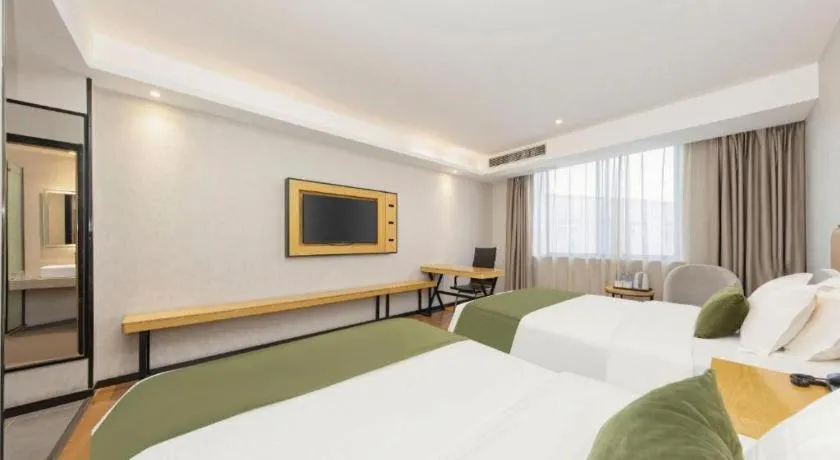 Bed in GreenTree Inn Ganzhou Gan County Bus Station