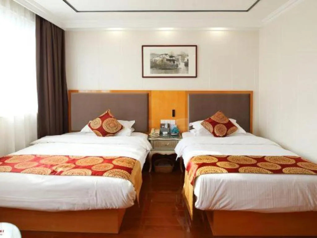 Bed in GreenTree Inn Wuxi Xinwu District Meicun Town Taibo Avenue