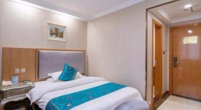 Bed in GreenTree Inn Wuxi Xinwu District Meicun Town Taibo Avenue