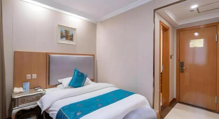 Bed in GreenTree Inn Wuxi Xinwu District Meicun Town Taibo Avenue