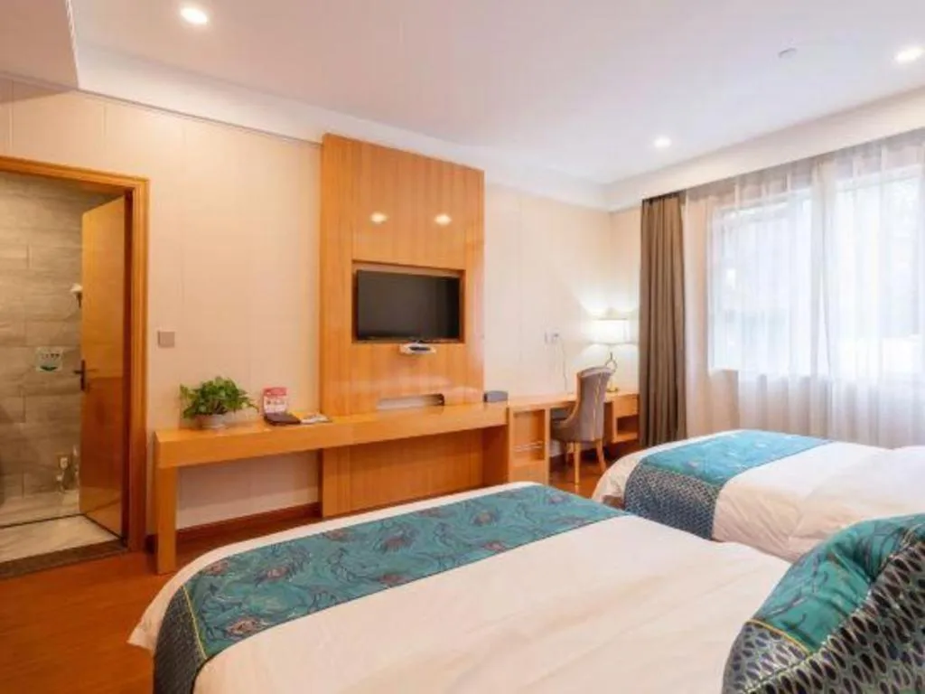 Bed in GreenTree Inn Wuxi Xinwu District Meicun Town Taibo Avenue