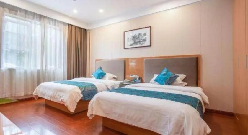 Bed in GreenTree Inn Wuxi Xinwu District Meicun Town Taibo Avenue