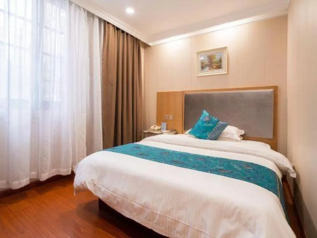 Bed in GreenTree Inn Wuxi Xinwu District Meicun Town Taibo Avenue