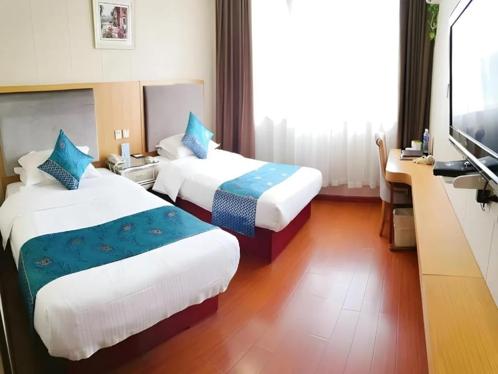 Bed in GreenTree Inn Wuxi Xinwu District Meicun Town Taibo Avenue