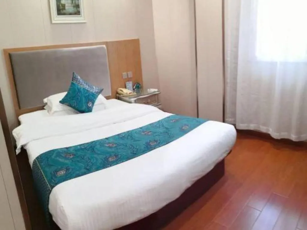 Bed in GreenTree Inn Wuxi Xinwu District Meicun Town Taibo Avenue
