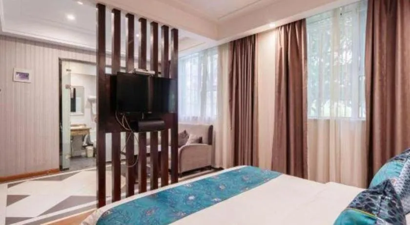 Bed in GreenTree Inn Wuxi Xinwu District Meicun Town Taibo Avenue