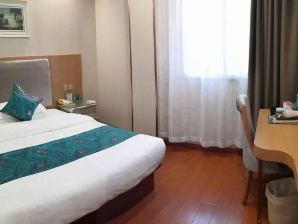 Bed in GreenTree Inn Wuxi Xinwu District Meicun Town Taibo Avenue