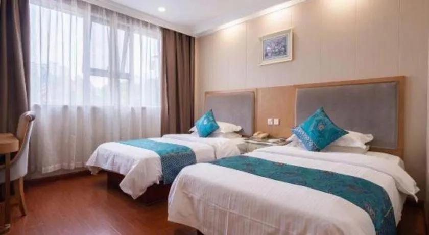 Bed in GreenTree Inn Wuxi Xinwu District Meicun Town Taibo Avenue