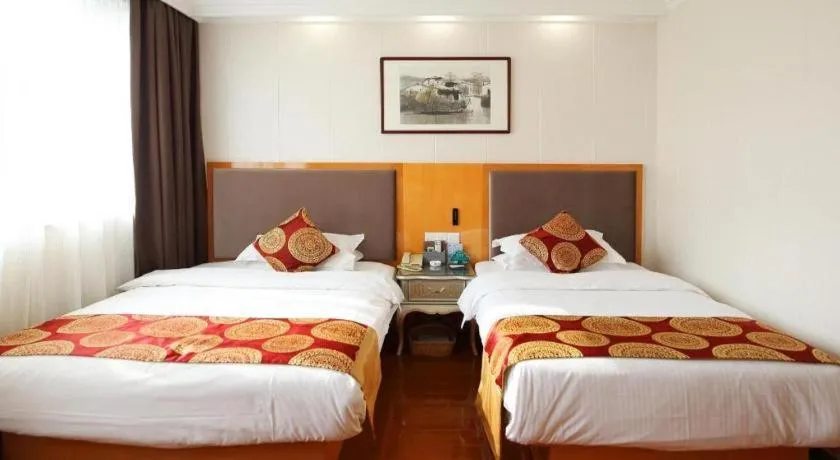 Bed in GreenTree Inn Wuxi Xinwu District Meicun Town Taibo Avenue