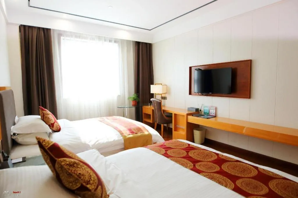 Bed in GreenTree Inn Wuxi Xinwu District Meicun Town Taibo Avenue