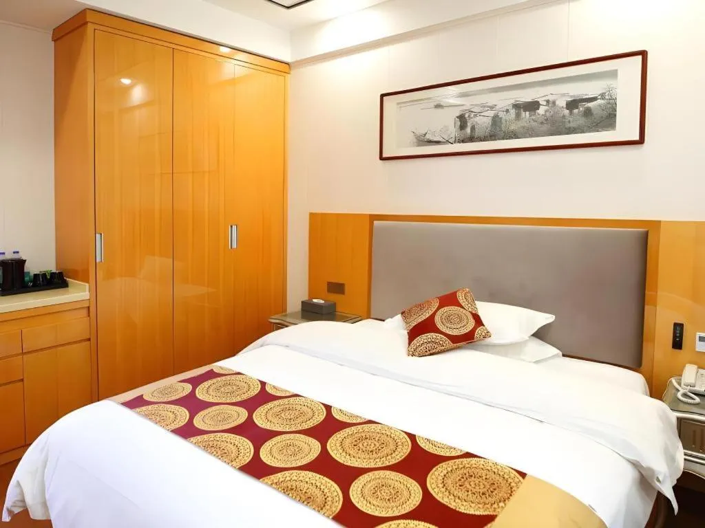 Bed in GreenTree Inn Wuxi Xinwu District Meicun Town Taibo Avenue