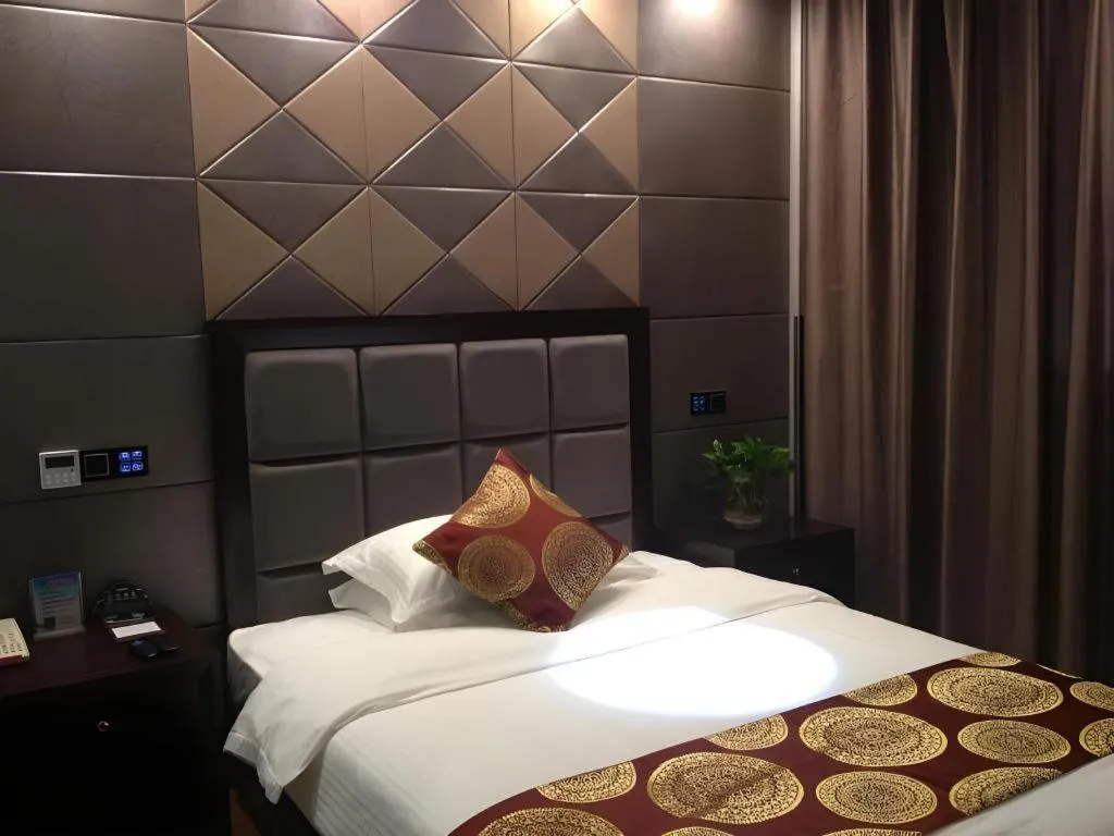 Bed in GreenTree Inn Wuxi Xinwu District Meicun Town Taibo Avenue