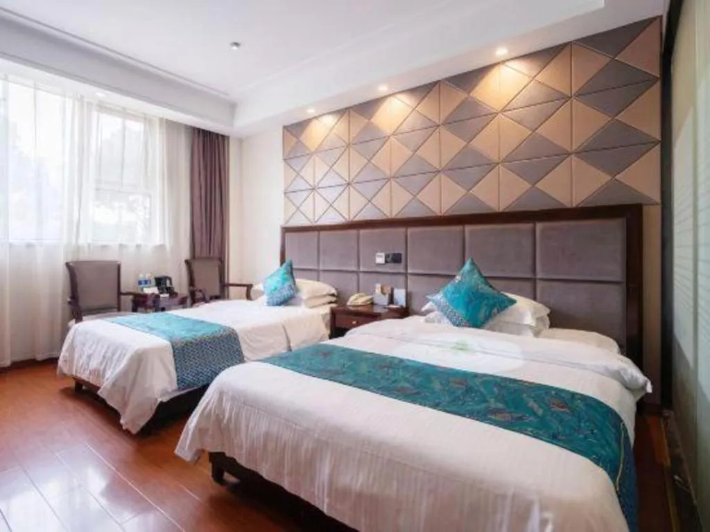 Bed in GreenTree Inn Wuxi Xinwu District Meicun Town Taibo Avenue