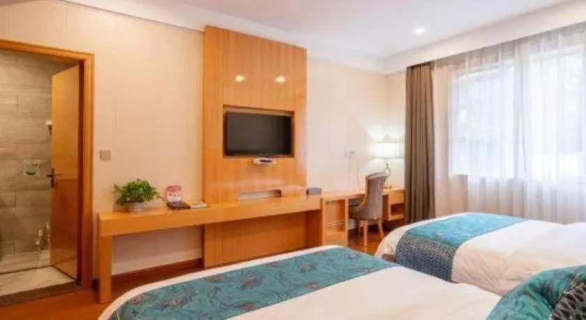 Bed in GreenTree Inn Wuxi Xinwu District Meicun Town Taibo Avenue