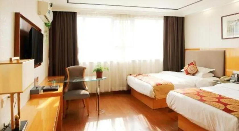 Bed in GreenTree Inn Wuxi Xinwu District Meicun Town Taibo Avenue