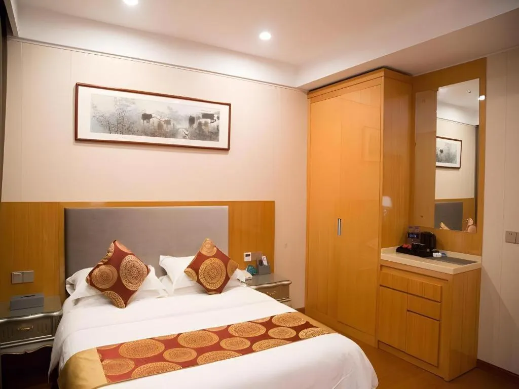 Bed in GreenTree Inn Wuxi Xinwu District Meicun Town Taibo Avenue