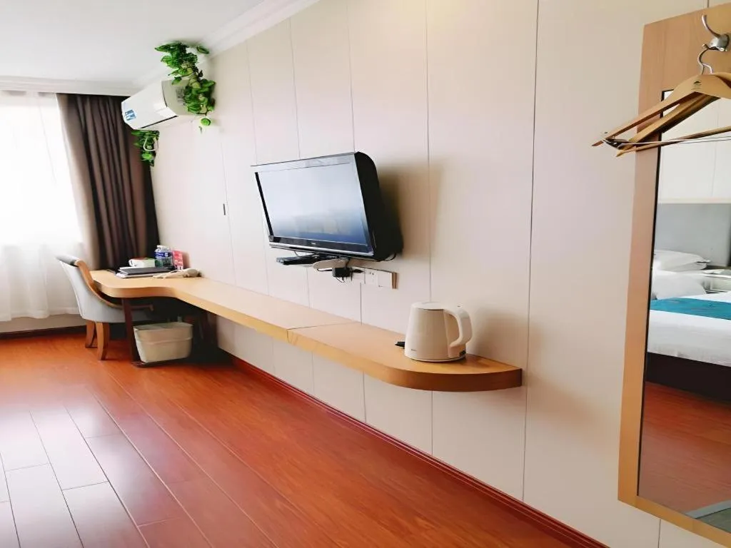 Bed in GreenTree Inn Wuxi Xinwu District Meicun Town Taibo Avenue