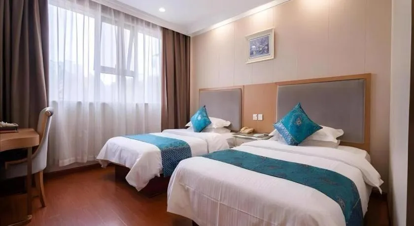 Bed in GreenTree Inn Wuxi Xinwu District Meicun Town Taibo Avenue
