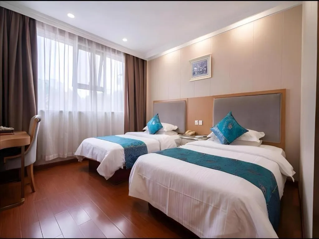 Bed in GreenTree Inn Wuxi Xinwu District Meicun Town Taibo Avenue