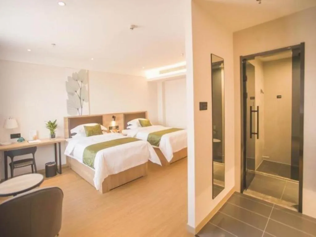 Bed in GreenTree Inn Express Taizhou Jiangyan Hardware City