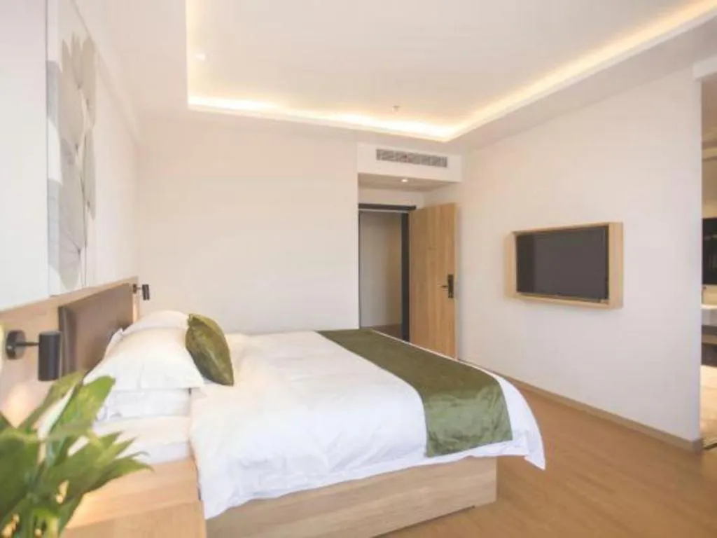 Bed in GreenTree Inn Express Taizhou Jiangyan Hardware City