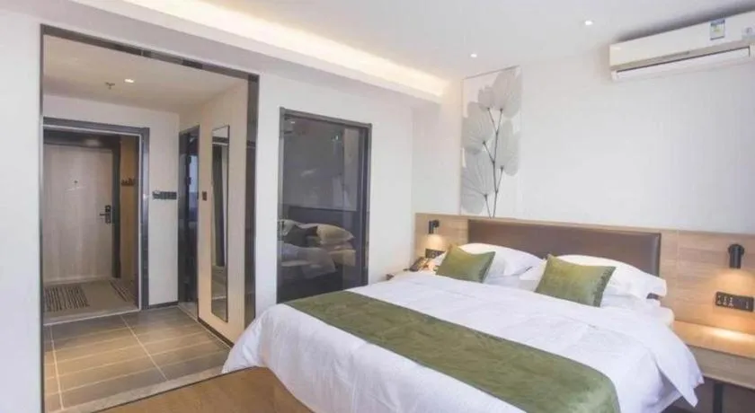 Bed in GreenTree Inn Express Taizhou Jiangyan Hardware City