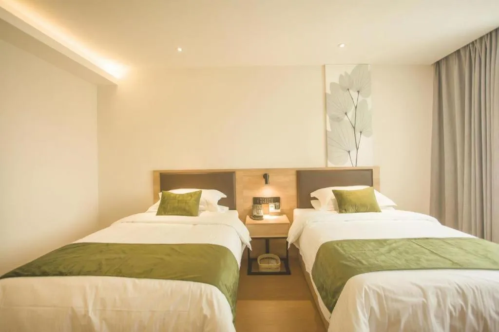 Bed in GreenTree Inn Express Taizhou Jiangyan Hardware City