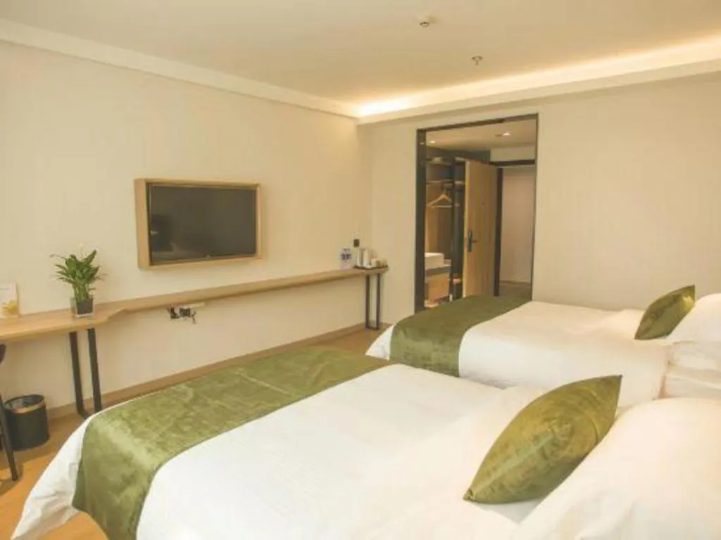 Bed in GreenTree Inn Express Taizhou Jiangyan Hardware City