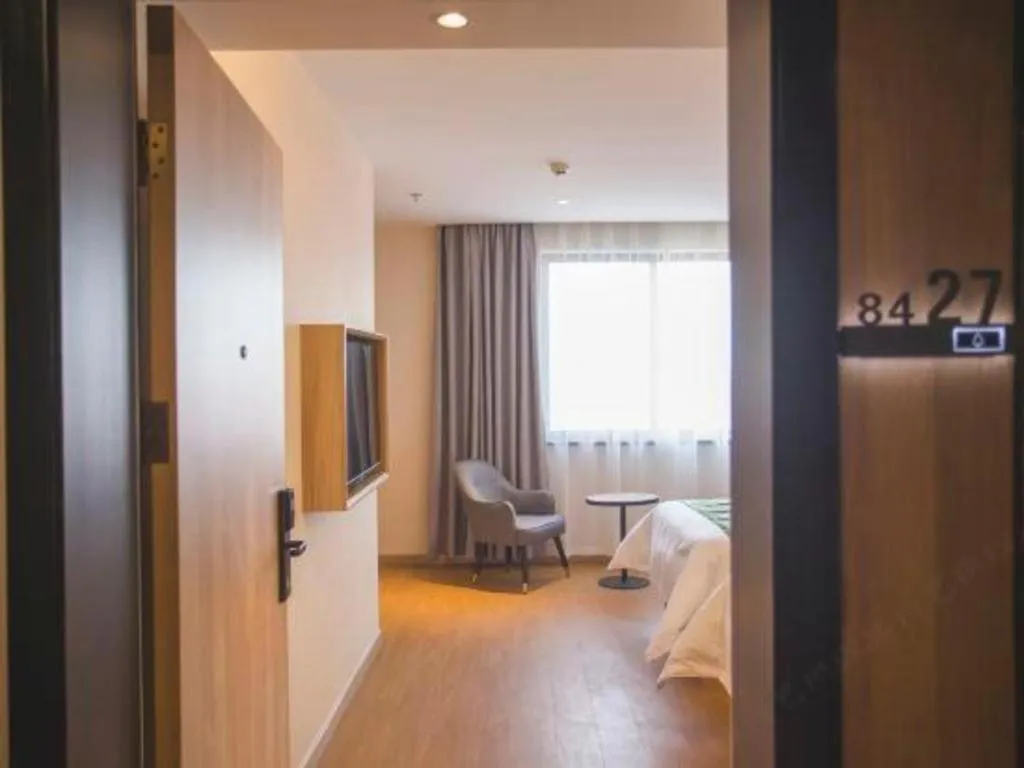 Bed in GreenTree Inn Express Taizhou Jiangyan Hardware City