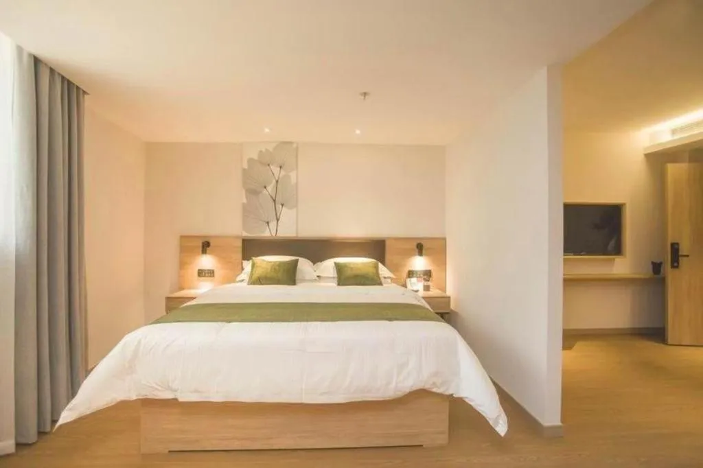 Bed in GreenTree Inn Express Taizhou Jiangyan Hardware City