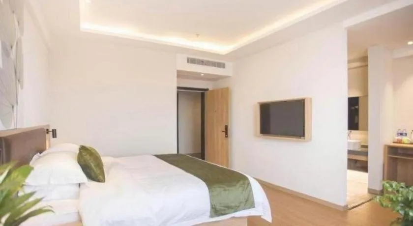 Bed in GreenTree Inn Express Taizhou Jiangyan Hardware City