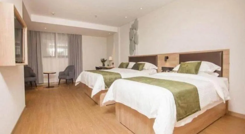 Bed in GreenTree Inn Express Taizhou Jiangyan Hardware City