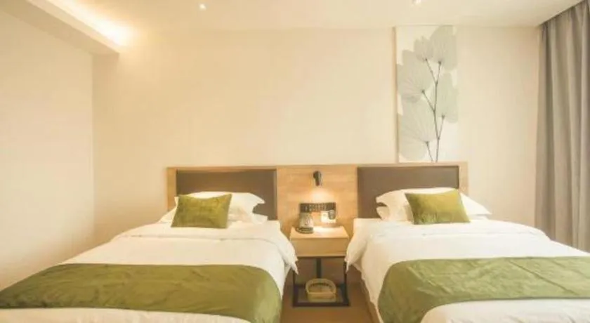 Bed in GreenTree Inn Express Taizhou Jiangyan Hardware City
