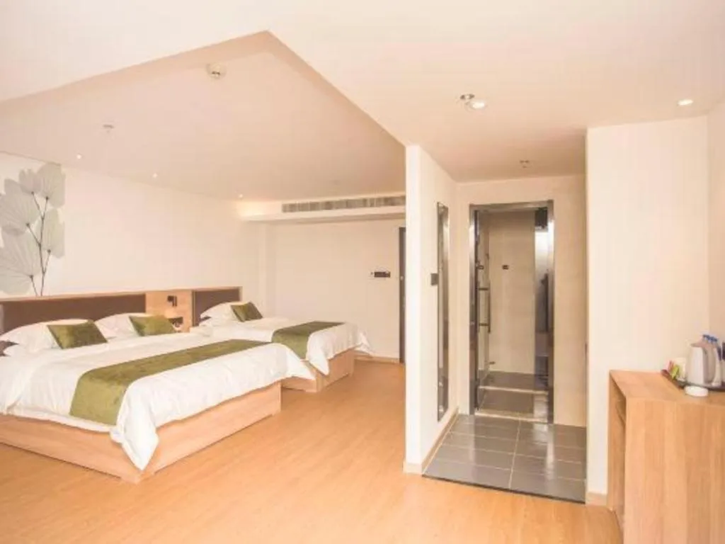 Bed in GreenTree Inn Express Taizhou Jiangyan Hardware City