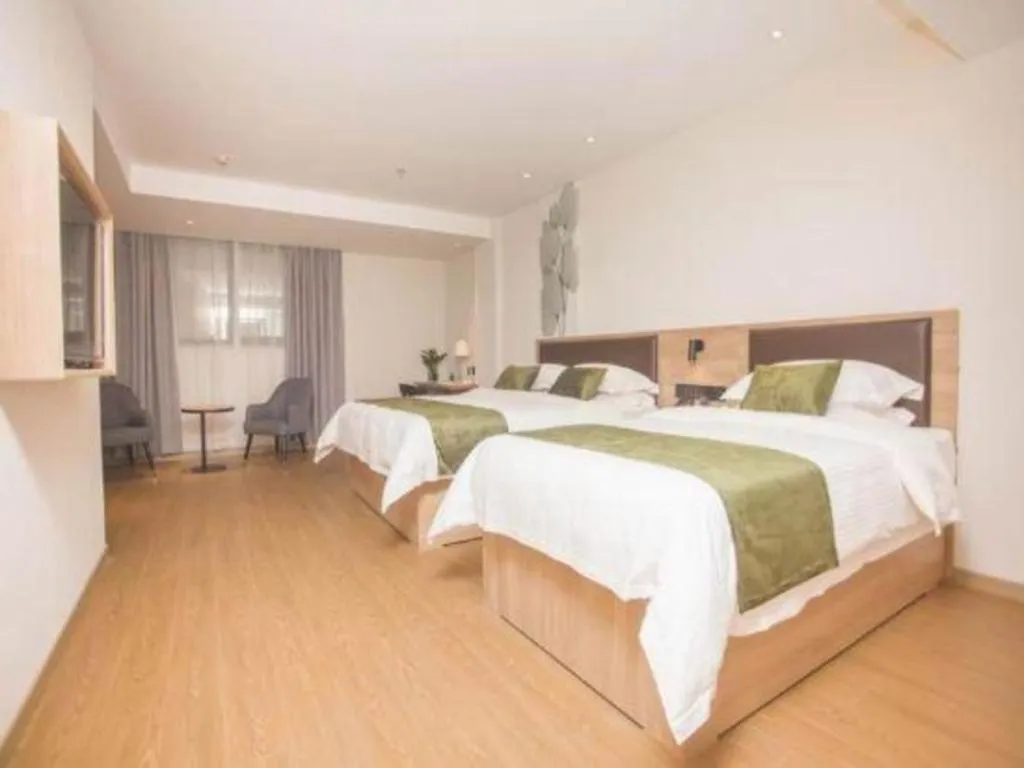 Bed in GreenTree Inn Express Taizhou Jiangyan Hardware City