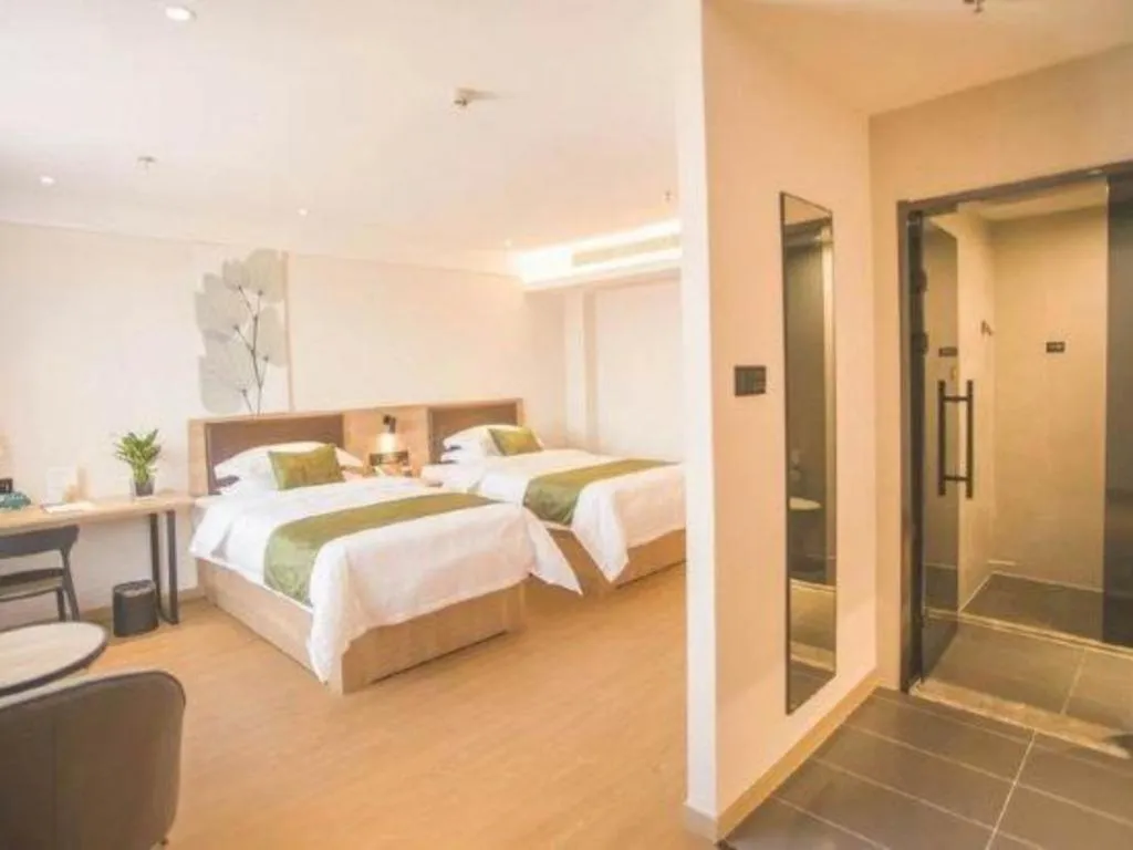 Bed in GreenTree Inn Express Taizhou Jiangyan Hardware City