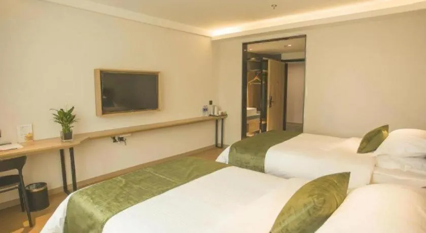 Bed in GreenTree Inn Express Taizhou Jiangyan Hardware City