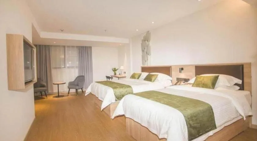 Bed in GreenTree Inn Express Taizhou Jiangyan Hardware City