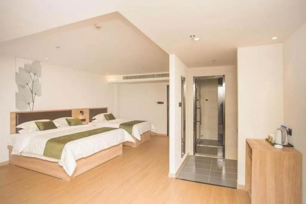 Bed in GreenTree Inn Express Taizhou Jiangyan Hardware City