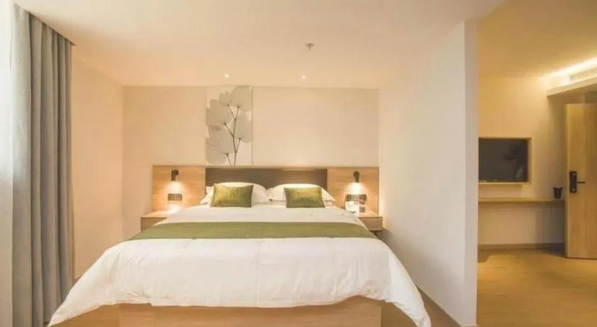 Bed in GreenTree Inn Express Taizhou Jiangyan Hardware City