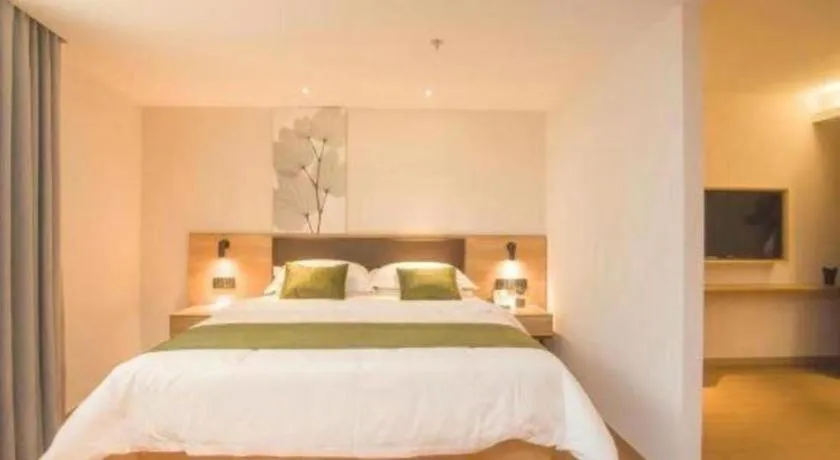 Bed in GreenTree Inn Express Taizhou Jiangyan Hardware City