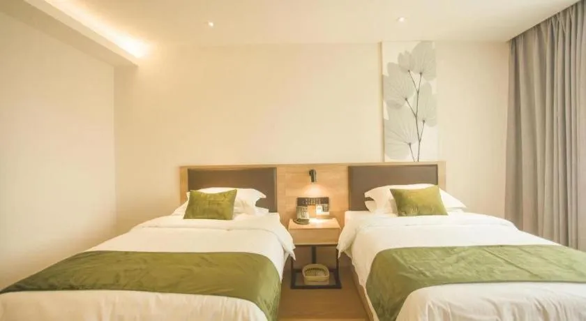 Bed in GreenTree Inn Express Taizhou Jiangyan Hardware City