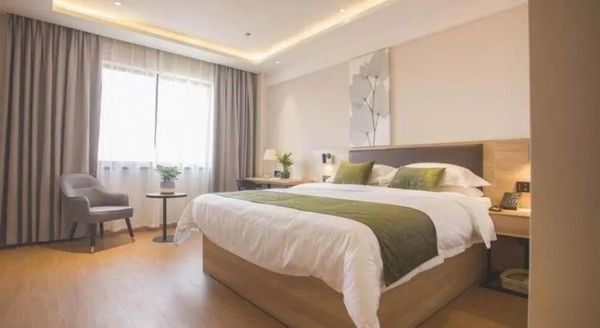 Bed in GreenTree Inn Express Taizhou Jiangyan Hardware City