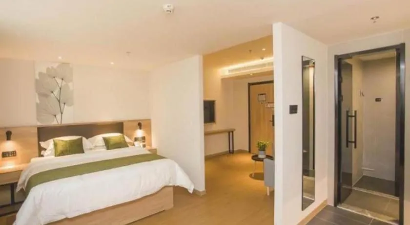 Bed in GreenTree Inn Express Taizhou Jiangyan Hardware City