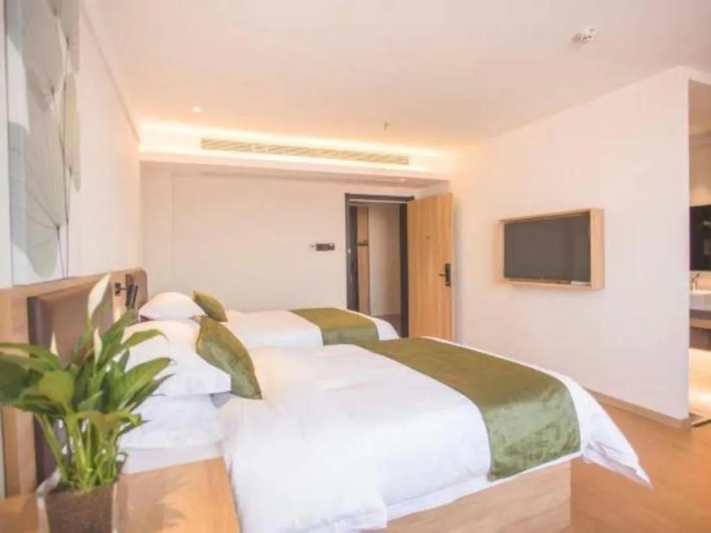 Bed in GreenTree Inn Express Taizhou Jiangyan Hardware City